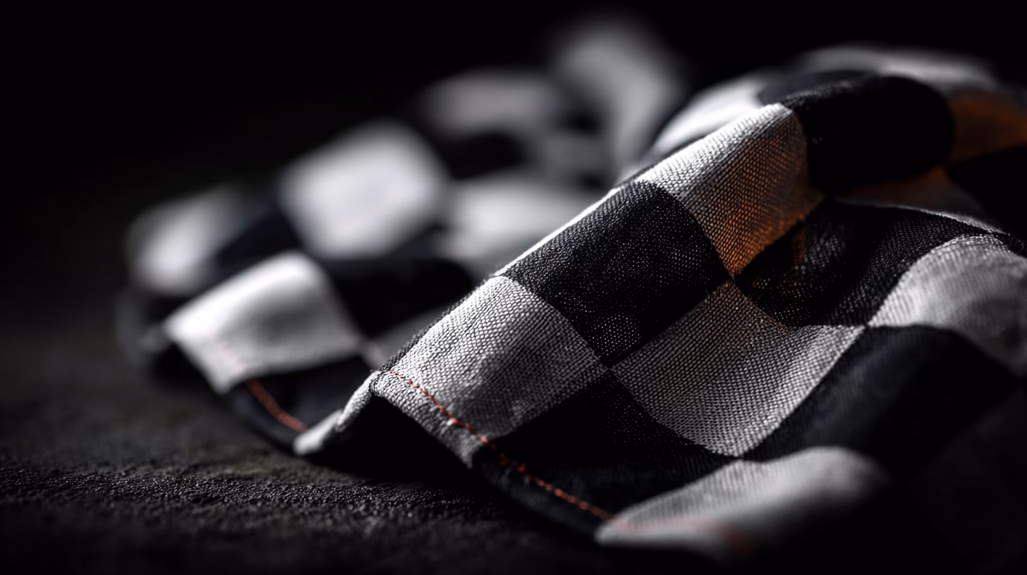 Van Geblokte Vlag tot Digitale Toekomst: De Geschiedenis en Toekomst van Racevlaggen